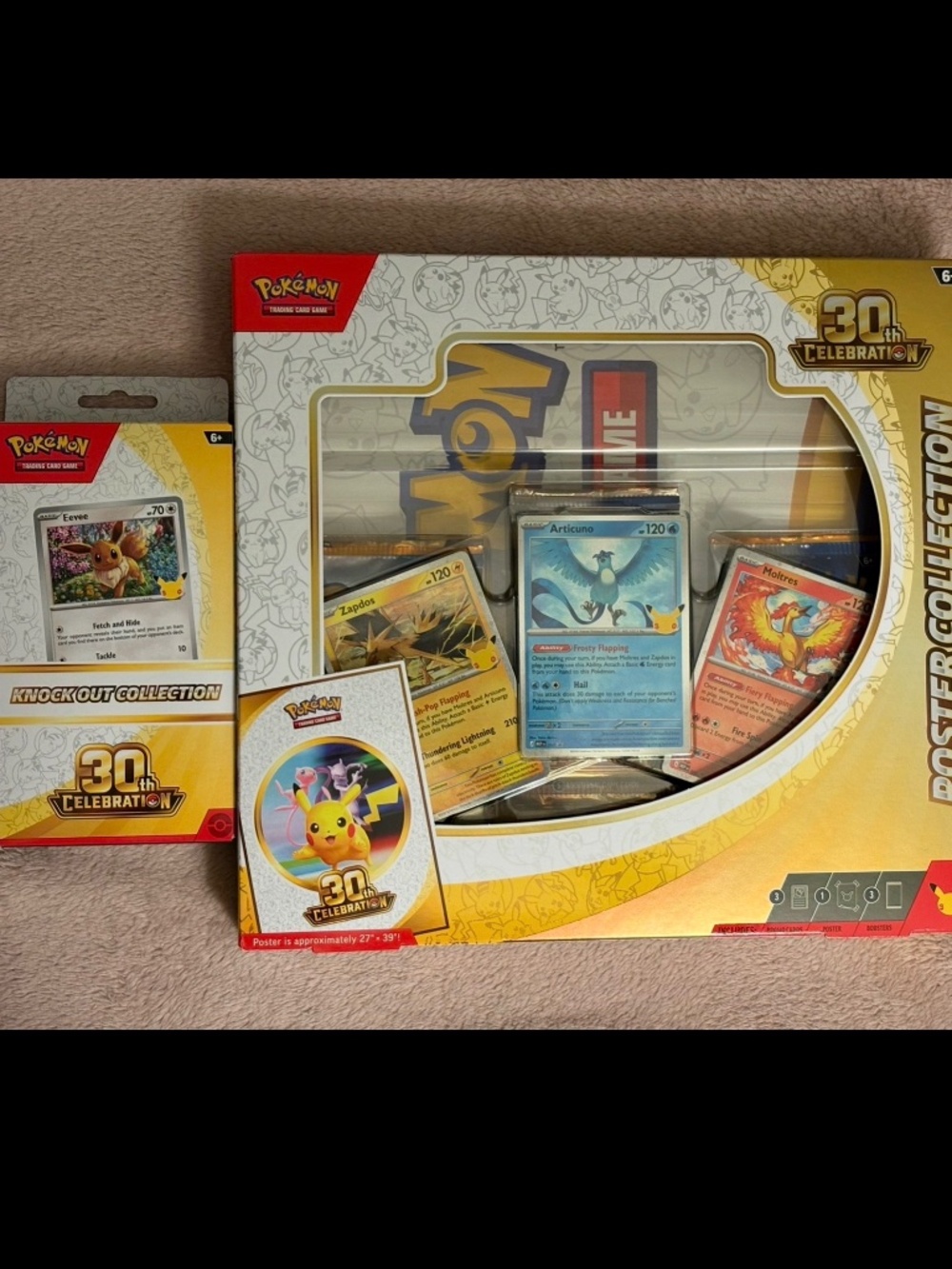 New in Box 30th Anniversary Pokémon Poster collection & Knockout Collection